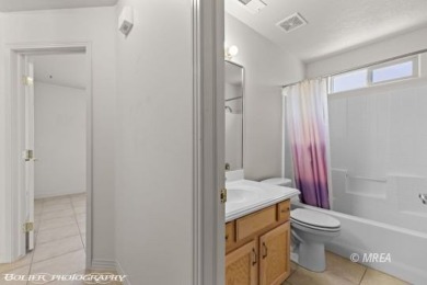 Welcome to 871 Falcon Glen Drive, a charming single-family home on Falcon Ridge Golf Course in Nevada - for sale on GolfHomes.com, golf home, golf lot