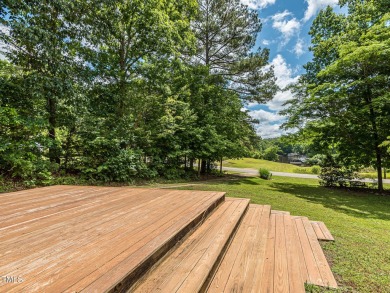 Welcome to Lake Royale! This adorable 3-bedroom home is situated on River Golf and County Club at Lake Royale in North Carolina - for sale on GolfHomes.com, golf home, golf lot