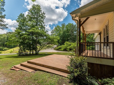 Welcome to Lake Royale! This adorable 3-bedroom home is situated on River Golf and County Club at Lake Royale in North Carolina - for sale on GolfHomes.com, golf home, golf lot