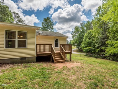 Welcome to Lake Royale! This adorable 3-bedroom home is situated on River Golf and County Club at Lake Royale in North Carolina - for sale on GolfHomes.com, golf home, golf lot