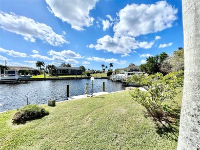 Waterfront home in Punta Gorda Isles! 3/2/2 split floorplan on Saint Andrews South Golf Club in Florida - for sale on GolfHomes.com, golf home, golf lot