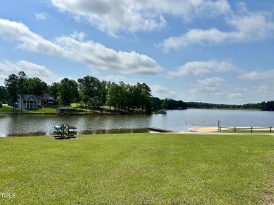 Welcome to Lake Royale! This adorable 3-bedroom home is situated on River Golf and County Club at Lake Royale in North Carolina - for sale on GolfHomes.com, golf home, golf lot