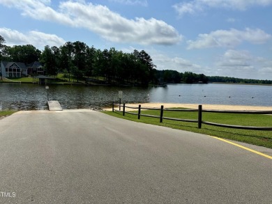Welcome to Lake Royale! This adorable 3-bedroom home is situated on River Golf and County Club at Lake Royale in North Carolina - for sale on GolfHomes.com, golf home, golf lot