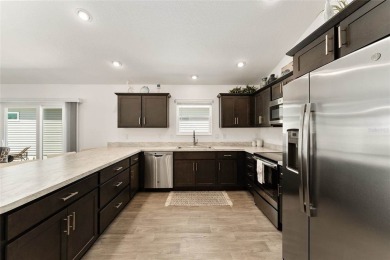 Beautiful 3-bed, 2-bath Charlotte Courtyard Villas with a VIEW! on Continental Country Club in Florida - for sale on GolfHomes.com, golf home, golf lot