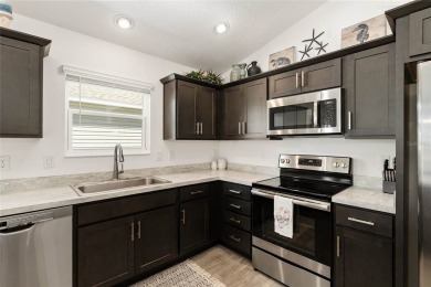 Beautiful 3-bed, 2-bath Charlotte Courtyard Villas with a VIEW! on Continental Country Club in Florida - for sale on GolfHomes.com, golf home, golf lot