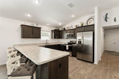 Beautiful 3-bed, 2-bath Charlotte Courtyard Villas with a VIEW! on Continental Country Club in Florida - for sale on GolfHomes.com, golf home, golf lot