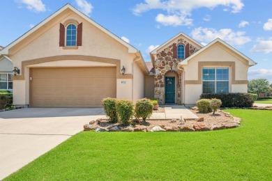 This delightful 2-bedroom home with a study and 2.5 baths is on Wildhorse Golf Club of Robson Ranch in Texas - for sale on GolfHomes.com, golf home, golf lot