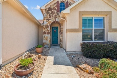 This delightful 2-bedroom home with a study and 2.5 baths is on Wildhorse Golf Club of Robson Ranch in Texas - for sale on GolfHomes.com, golf home, golf lot