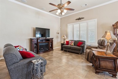 This delightful 2-bedroom home with a study and 2.5 baths is on Wildhorse Golf Club of Robson Ranch in Texas - for sale on GolfHomes.com, golf home, golf lot