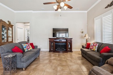 This delightful 2-bedroom home with a study and 2.5 baths is on Wildhorse Golf Club of Robson Ranch in Texas - for sale on GolfHomes.com, golf home, golf lot