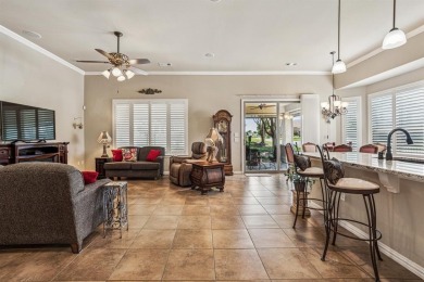 This delightful 2-bedroom home with a study and 2.5 baths is on Wildhorse Golf Club of Robson Ranch in Texas - for sale on GolfHomes.com, golf home, golf lot