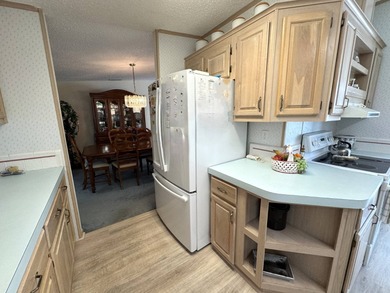 Discover this well maintained manufactured home located in the on Schalamar Creek Golf and Country Club in Florida - for sale on GolfHomes.com, golf home, golf lot