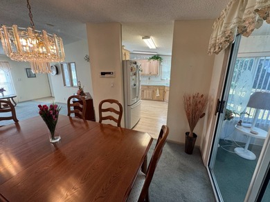 Discover this well maintained manufactured home located in the on Schalamar Creek Golf and Country Club in Florida - for sale on GolfHomes.com, golf home, golf lot