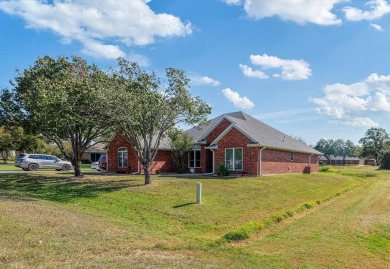 Discover this charming 3-bedroom, 2-bath home on a peaceful on Pecan Plantation Country Club in Texas - for sale on GolfHomes.com, golf home, golf lot