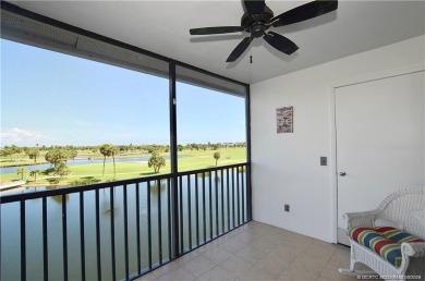 Expansive views of the resort's golf course  ponds. This on Ocean Club At the Hutchinson Island Beach Resort and Marina in Florida - for sale on GolfHomes.com, golf home, golf lot