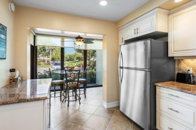 Enjoy picturesque views of the lush golf course and serene on Quail Ridge Golf Course and Country Club in Florida - for sale on GolfHomes.com, golf home, golf lot