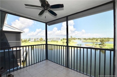 Expansive views of the resort's golf course  ponds. This on Ocean Club At the Hutchinson Island Beach Resort and Marina in Florida - for sale on GolfHomes.com, golf home, golf lot