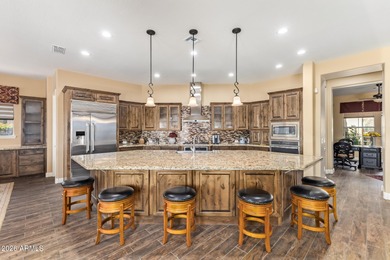 Stunning, barely lived-in home designed for seamless on Estrella Mountain Ranch Golf Course in Arizona - for sale on GolfHomes.com, golf home, golf lot