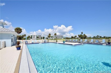 Expansive views of the resort's golf course  ponds. This on Ocean Club At the Hutchinson Island Beach Resort and Marina in Florida - for sale on GolfHomes.com, golf home, golf lot