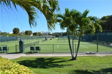 Expansive views of the resort's golf course  ponds. This on Ocean Club At the Hutchinson Island Beach Resort and Marina in Florida - for sale on GolfHomes.com, golf home, golf lot