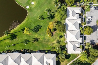 Enjoy picturesque views of the lush golf course and serene on Quail Ridge Golf Course and Country Club in Florida - for sale on GolfHomes.com, golf home, golf lot