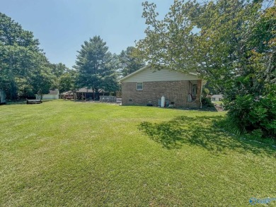 This spacious 3 bedroom, 2 bath family home is nestled on a 1 on Brookside Golf Course in Alabama - for sale on GolfHomes.com, golf home, golf lot