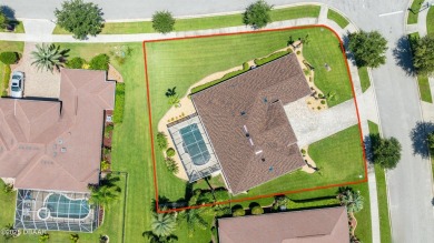 LAKE VIEWS o SCREENED POOL o BRAND NEW ROOF  AC o LOCATED IN on Venetian Bay Golf Course in Florida - for sale on GolfHomes.com, golf home, golf lot