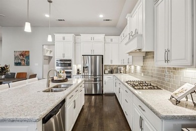 Welcome to Lakeside Luxury in The Tribute's Exclusive Waterford on The Tribute At the Colony in Texas - for sale on GolfHomes.com, golf home, golf lot