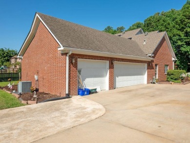 Step into timeless luxury with this 4-bed, 4-bath, 3-car garage on Maumelle Golf and Country Club in Arkansas - for sale on GolfHomes.com, golf home, golf lot