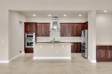 GORGEOUS HOME ON PREMIUM GOLF COURSE LOT LOCATED IN THE on Wildhorse Golf Club of Robson Ranch in Texas - for sale on GolfHomes.com, golf home, golf lot