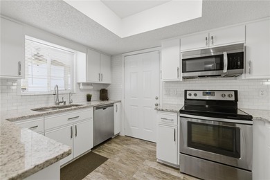 Welcome home to Spruce Creek South, a truly gated, 55+ on The Links of Spruce Creek in Florida - for sale on GolfHomes.com, golf home, golf lot