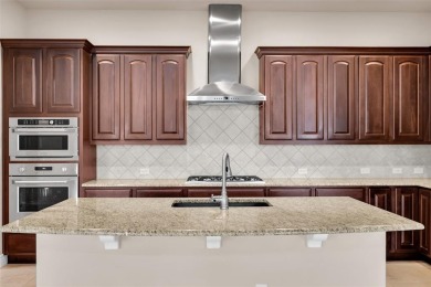 GORGEOUS HOME ON PREMIUM GOLF COURSE LOT LOCATED IN THE on Wildhorse Golf Club of Robson Ranch in Texas - for sale on GolfHomes.com, golf home, golf lot