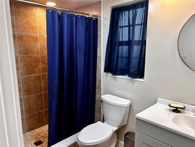 NOT in a 55+ community, this charming updated 2 bedroom, 2 bath on Bayou Golf Club in Florida - for sale on GolfHomes.com, golf home, golf lot