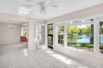 Sought out Villa located on a tranquil and serene pond front lot on Highland Lakes Executive Golf Course in Florida - for sale on GolfHomes.com, golf home, golf lot