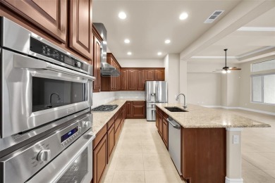 GORGEOUS HOME ON PREMIUM GOLF COURSE LOT LOCATED IN THE on Wildhorse Golf Club of Robson Ranch in Texas - for sale on GolfHomes.com, golf home, golf lot
