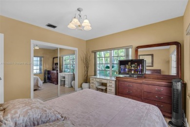 Located inside the exclusive 24-hour guard-gated Normandy Island on Normandy Shores Golf Course in Florida - for sale on GolfHomes.com, golf home, golf lot