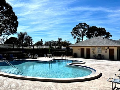 NOT in a 55+ community, this charming updated 2 bedroom, 2 bath on Bayou Golf Club in Florida - for sale on GolfHomes.com, golf home, golf lot