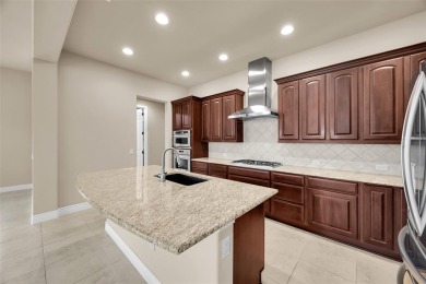 GORGEOUS HOME ON PREMIUM GOLF COURSE LOT LOCATED IN THE on Wildhorse Golf Club of Robson Ranch in Texas - for sale on GolfHomes.com, golf home, golf lot