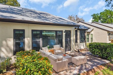 Sought out Villa located on a tranquil and serene pond front lot on Highland Lakes Executive Golf Course in Florida - for sale on GolfHomes.com, golf home, golf lot