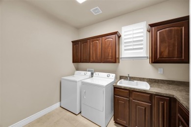 GORGEOUS HOME ON PREMIUM GOLF COURSE LOT LOCATED IN THE on Wildhorse Golf Club of Robson Ranch in Texas - for sale on GolfHomes.com, golf home, golf lot