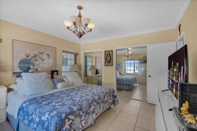 Located inside the exclusive 24-hour guard-gated Normandy Island on Normandy Shores Golf Course in Florida - for sale on GolfHomes.com, golf home, golf lot