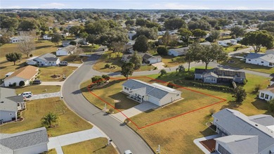 Welcome home to Spruce Creek South, a truly gated, 55+ on The Links of Spruce Creek in Florida - for sale on GolfHomes.com, golf home, golf lot