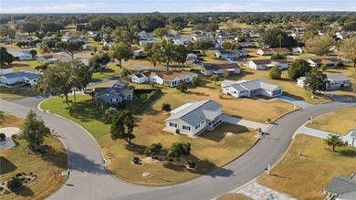 Welcome home to Spruce Creek South, a truly gated, 55+ on The Links of Spruce Creek in Florida - for sale on GolfHomes.com, golf home, golf lot