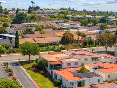 Set on an elevated corner lot in Oceana--Oceanside's premier 55+ on Emerald Isle Golf Course in California - for sale on GolfHomes.com, golf home, golf lot