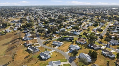 Welcome home to Spruce Creek South, a truly gated, 55+ on The Links of Spruce Creek in Florida - for sale on GolfHomes.com, golf home, golf lot