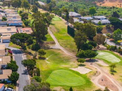 Set on an elevated corner lot in Oceana--Oceanside's premier 55+ on Emerald Isle Golf Course in California - for sale on GolfHomes.com, golf home, golf lot