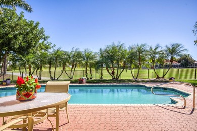 Enjoy the finest of Florida living in this stunning single-story on Ironhorse Country Club in Florida - for sale on GolfHomes.com, golf home, golf lot