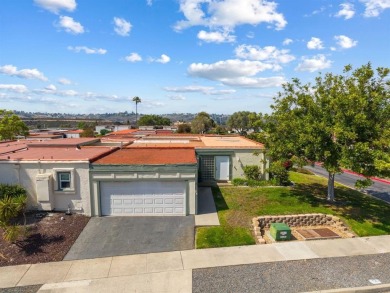 Set on an elevated corner lot in Oceana--Oceanside's premier 55+ on Emerald Isle Golf Course in California - for sale on GolfHomes.com, golf home, golf lot
