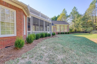 Welcome to this stunning 4-bedroom/4.5-bathroom home nestled on on The Carolina Country Club in South Carolina - for sale on GolfHomes.com, golf home, golf lot