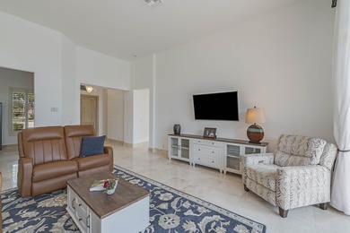 Enjoy the finest of Florida living in this stunning single-story on Ironhorse Country Club in Florida - for sale on GolfHomes.com, golf home, golf lot